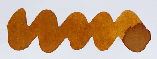 Wavy brown line on a white background. Diamine Brandy Snap fountain pen ink colour swatch.