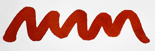 Wavy orange line on a white background. Diamine Blood Orange fountain pen ink colour swatch.