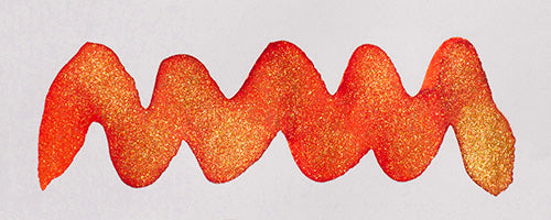Wavy orange line on a white background. Diamine Rockin Rio fountain pen ink colour swatch.
