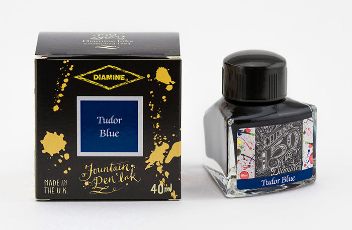 Diamine Tudor Blue fountain pen ink bottle and packaging on a white background.
