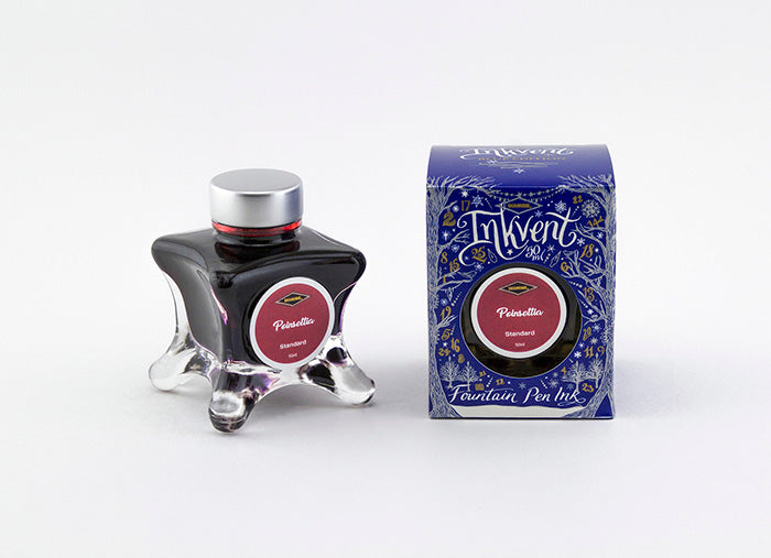 Diamine Poinsettia fountain pen ink bottle and packaging on a white background.