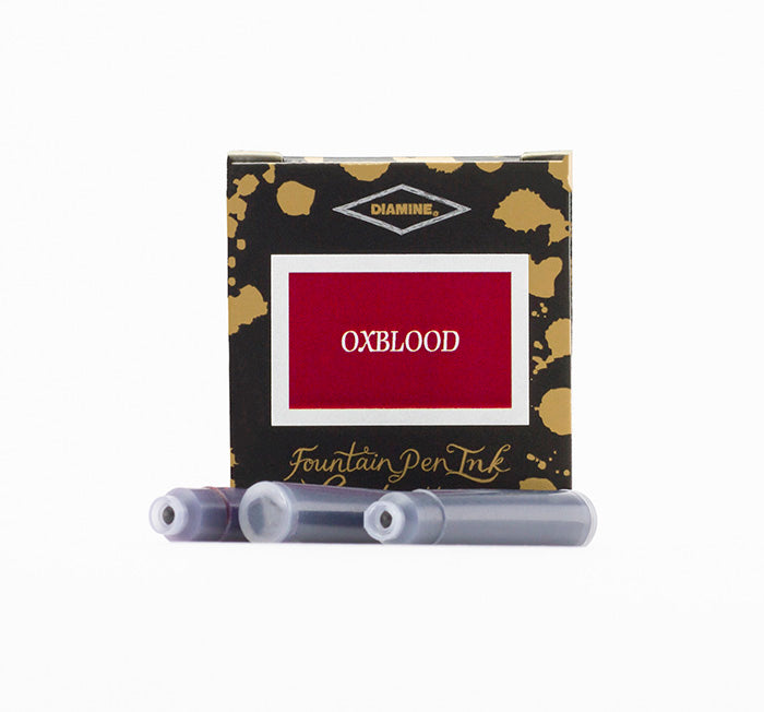 Diamine Oxblood fountain pen ink cartridges and packaging box on a white background.