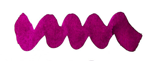 Wavy purple line on a white background. Diamine Jingle Berry fountain pen ink colour swatch.