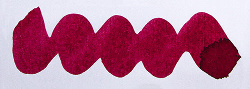 Wavy pink line on a white background. Diamine Raspberry Rose fountain pen ink colour swatch.
