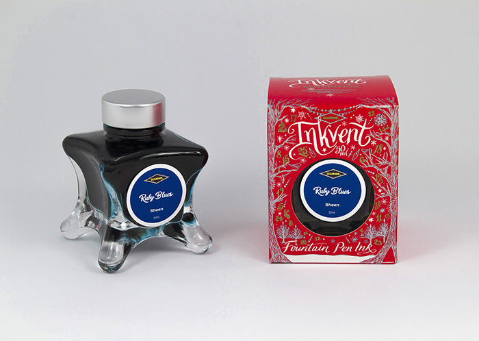 Diamine Ruby Blues fountain pen ink bottle and packaging on a white background.