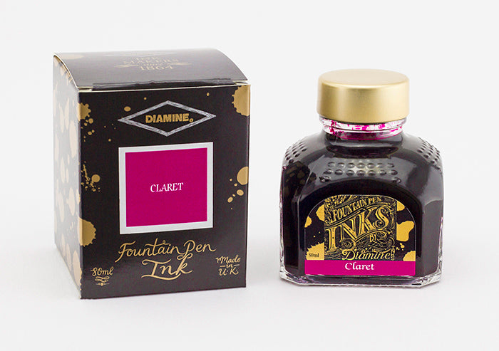 Diamine Claret fountain pen ink bottle and packaging on a white background.