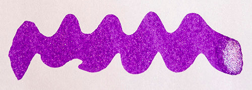 Wavy purple line on a white background. Diamine Lilac Satin fountain pen ink colour swatch.
