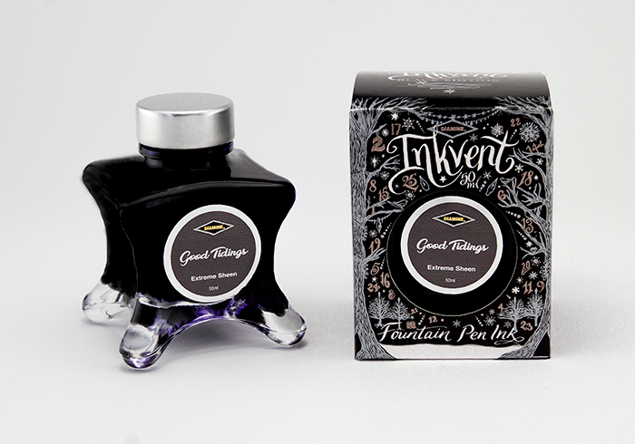 Diamine Good Tidings fountain pen ink bottle and packaging on a white background.