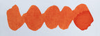 Wavy orange line on a white background. Diamine Peach Punch fountain pen ink colour swatch.
