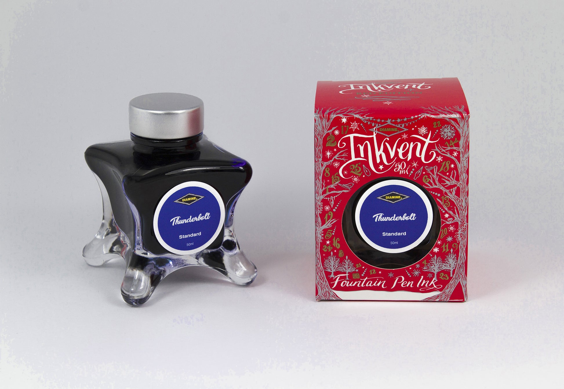 Diamine Thunderbolt fountain pen ink bottle and packaging on a white background.