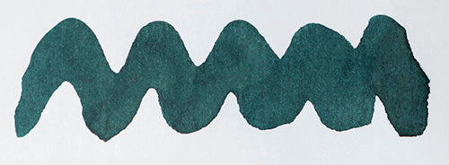Wavy teal line on a white background. Diamine Aurora Borealis fountain pen ink colour swatch.