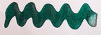 Wavy teal line on a white background. Diamine Enchanted Ocean fountain pen ink colour swatch.