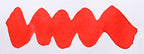 Wavy pink line on a white background. Diamine Cosy Up fountain pen ink colour swatch.