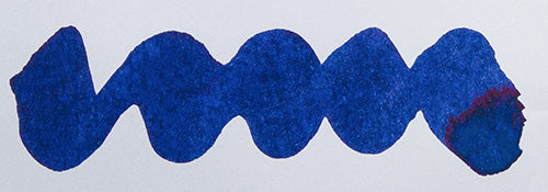 Wavy blue line on a white background. Diamine Ruby Blues fountain pen ink colour swatch.