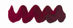 Wavy burgundy line on a white background. Diamine Writer's Blood fountain pen ink colour swatch.