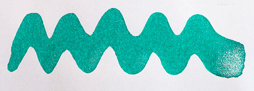 Wavy teal line on a white background. Diamine Tropical Glow fountain pen ink colour swatch.