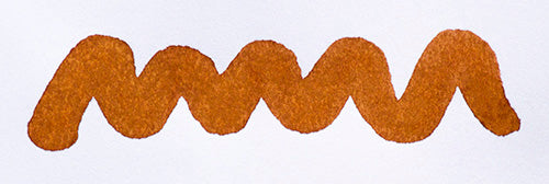 Wavy brown line on a white background. Diamine Warm Brown fountain pen ink colour swatch.