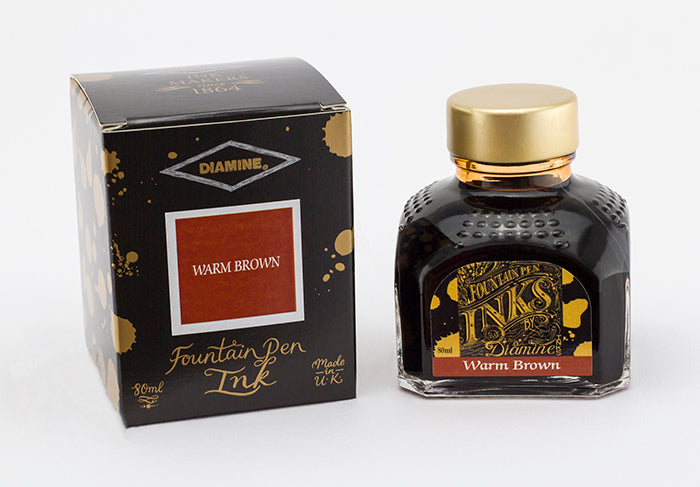 Diamine Warm Brown fountain pen ink bottle and packaging on a white background.