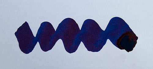 Wavy blue line on a white background. Diamine Midnight Hour fountain pen ink colour swatch.
