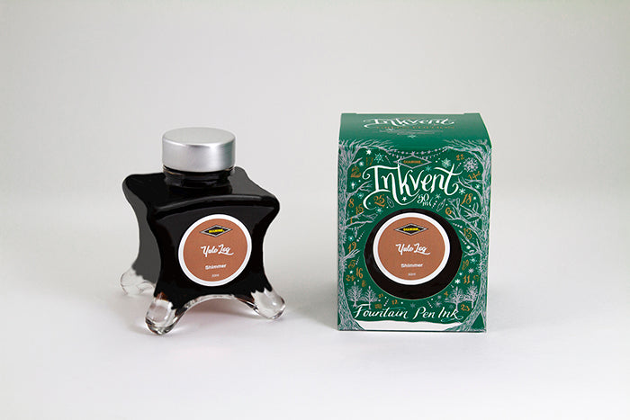 Diamine Yule Log fountain pen ink bottle and packaging on a white background.