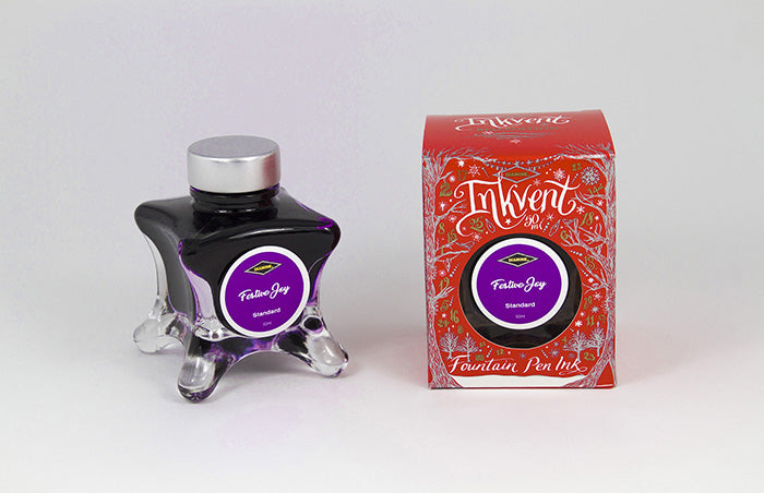 Diamine Festive Joy fountain pen ink bottle and packaging on a white background.
