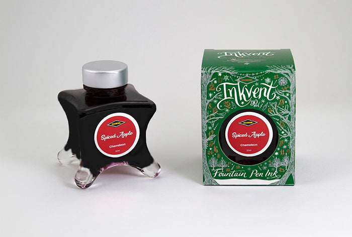 Diamine Spiced Apple fountain pen ink bottle and packaging on a white background.
