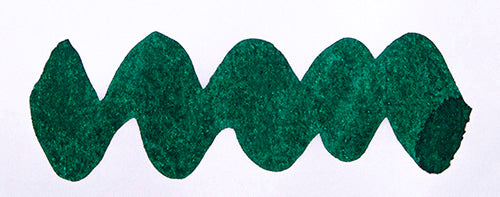 Wavy green line on a white background. Diamine Spruce fountain pen ink colour swatch.