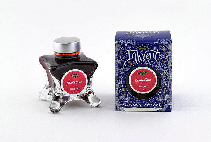Diamine Candy Cane fountain pen ink bottle and packaging on a white background.