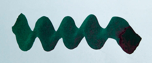 Wavy teal line on a white background. Diamine Seasons Greetings fountain pen ink colour swatch.