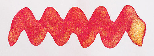 Wavy pink line on a white background. Diamine Pink Glitz fountain pen ink colour swatch.