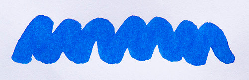 Wavy blue line on a white background. Diamine Washable Blue fountain pen ink colour swatch.