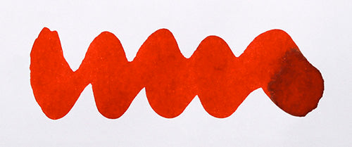 Wavy red line on a white background. Diamine Cardinal fountain pen ink colour swatch.