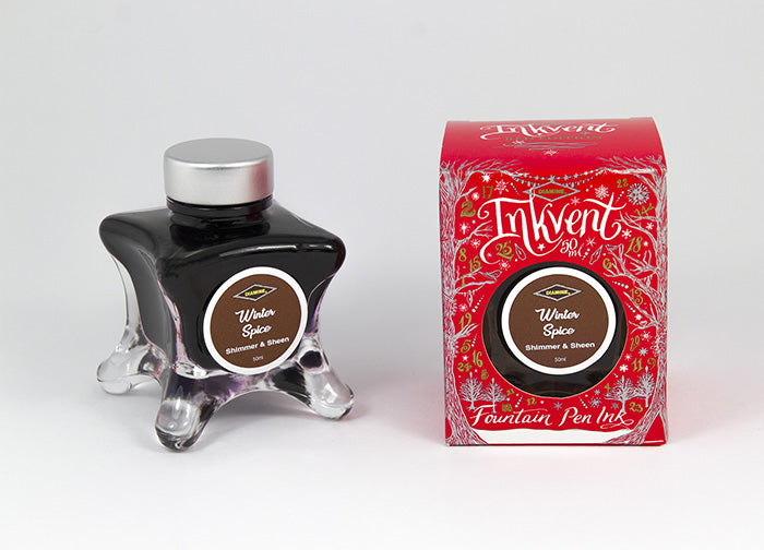 Diamine Winter Spice fountain pen ink bottle and packaging on a white background.