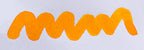 Wavy yellow line on a white background. Diamine Amber fountain pen ink colour swatch.