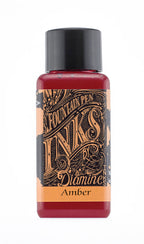 Diamine Amber fountain pen ink bottle and packaging on a white background.