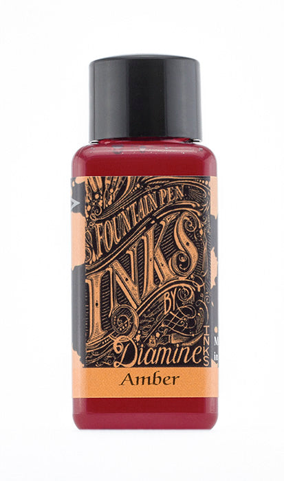 Diamine Amber fountain pen ink bottle and packaging on a white background.