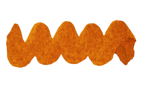 Wavy brown line on a white background. Diamine Cinnabun fountain pen ink colour swatch.