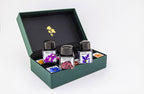 Set of 10 Diamine fountain pen ink bottles in an open green gift set box on a white background.