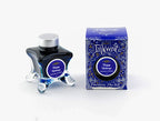 Diamine Happy Holidays fountain pen ink bottle and packaging on a white background.