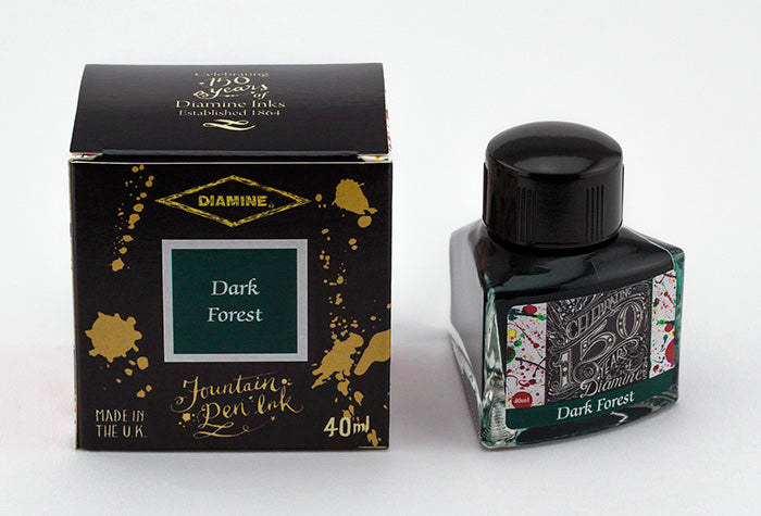 Diamine Dark Forest fountain pen ink bottle and packaging on a white background.