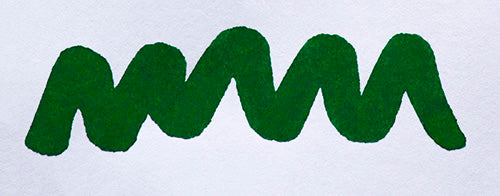 Wavy green line on a white background. Diamine Tropical Green fountain pen ink colour swatch.