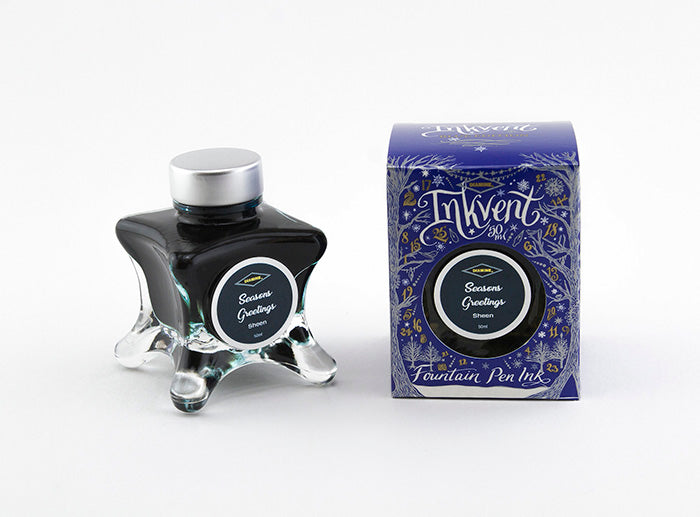 Diamine Seasons Greetings fountain pen ink bottle and packaging on a white background.