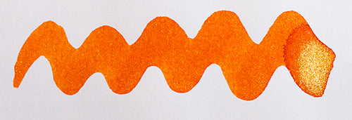 Wavy orange line on a white background. Diamine Inferno Orange fountain pen ink colour swatch.