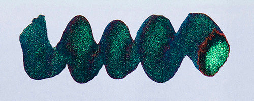 Wavy navy blue line on a white background. Diamine Upon a Star fountain pen ink colour swatch.