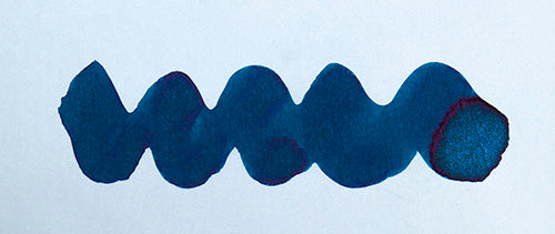 Wavy blue line on a white background. Diamine Jack Frost fountain pen ink colour swatch.