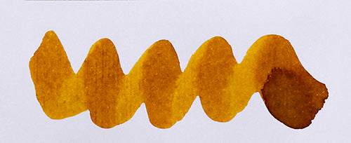 Wavy brown line on a white background. Diamine Three Kings fountain pen ink colour swatch.