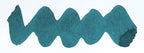 Wavy teal line on a white background. Diamine Yuletide fountain pen ink colour swatch.