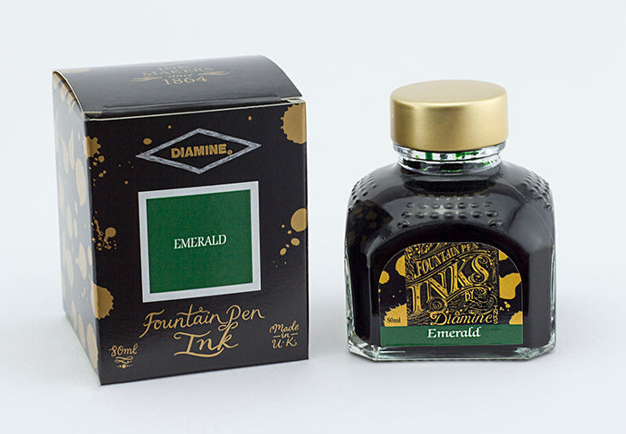 Diamine Emerald fountain pen ink bottle and packaging on a white background.