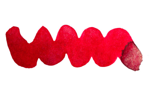 Wavy red line on a white background. Diamine Tinsel fountain pen ink colour swatch.