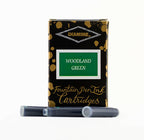 Diamine Woodland Green fountain pen ink cartridges and packaging box on a white background.